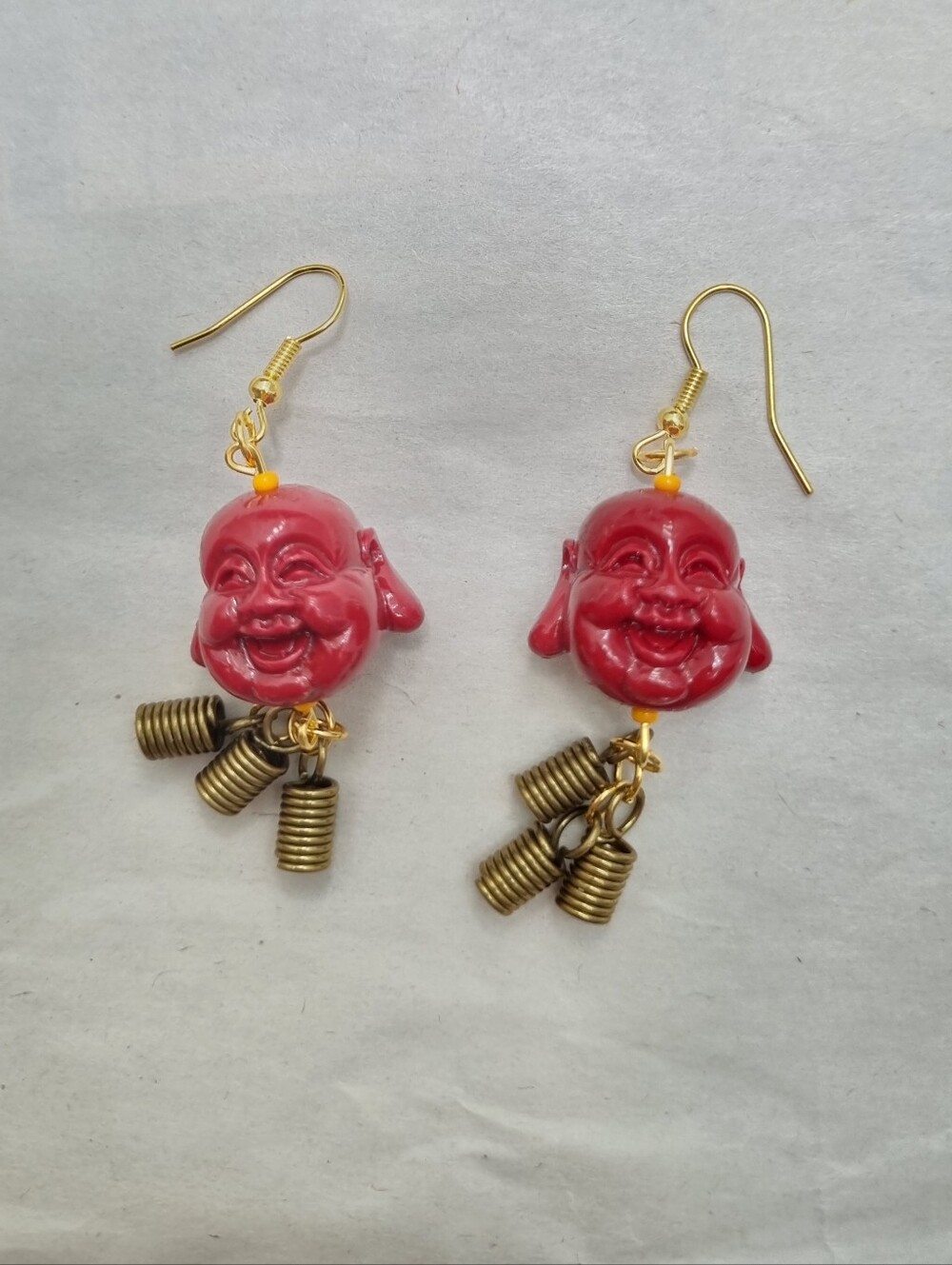 Earrings | Smiling Laughing Budai In Red With Funky Tassel